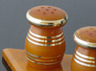 Orange bakelite salt and pepper