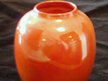 Orange lustre ware by Royal Doulton
