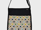 Orla Kiely fabric on the front pocket of the handbag. Made in NZ