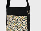 Orla Kiely flower fabric on front pocket of a laptop/work bag