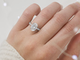 Oval Cut Claw Set Diamond Shoulder Ring