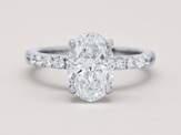 oval cut diamond claw set diamond band solitaire engagement ring design