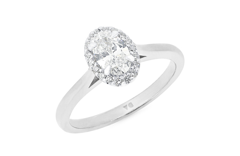 Oval diamond halo engagement ring in 18ct white gold platinum