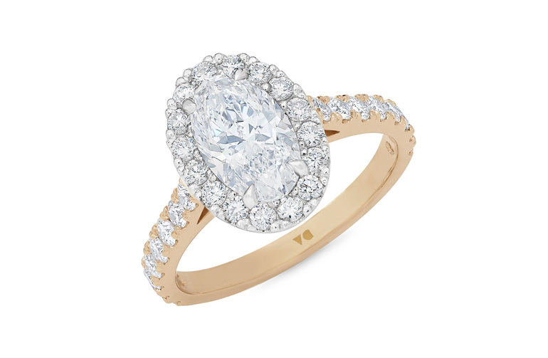 Oval diamond halo engagement ring with diamond band 18ct rose gold platinum