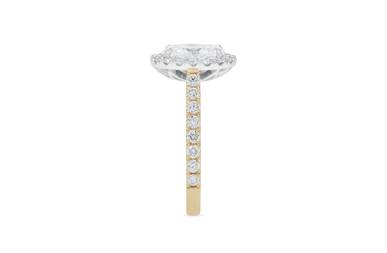 Oval diamond halo engagement ring with diamond band 18ct yellow gold platinum