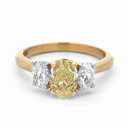 Oval Fancy Yellow Diamond and Diamond Three Stone Ring