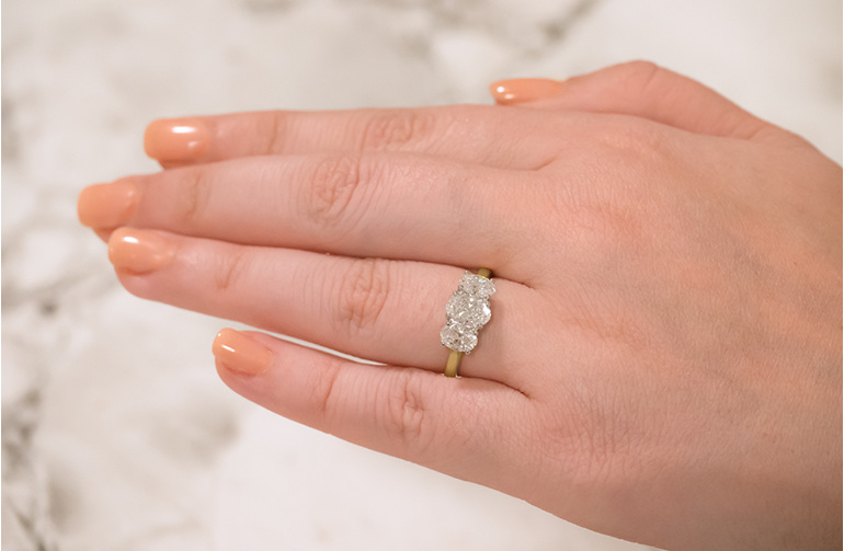 Oval three stone diamond engagement ring
