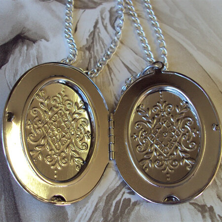 Over-sized silver locket on silver chain