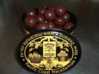painted tin of chocolate macadamia nuts