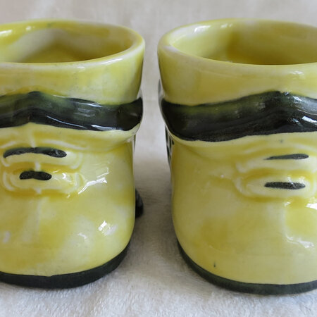 Pair of little shoe-house egg cups
