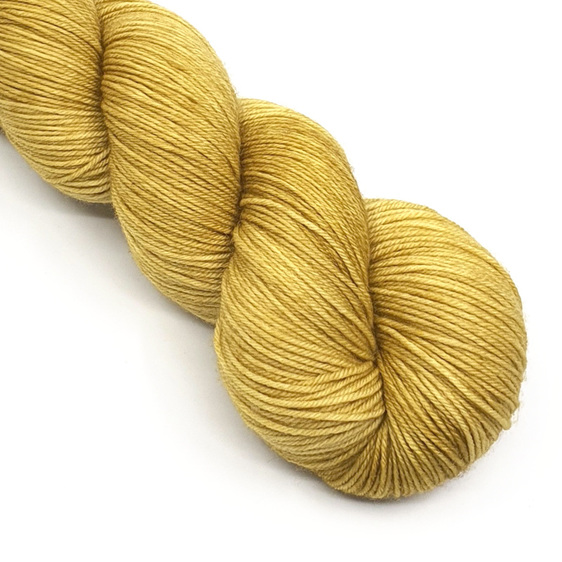 part twisted skein of yarn in a ginger colourway