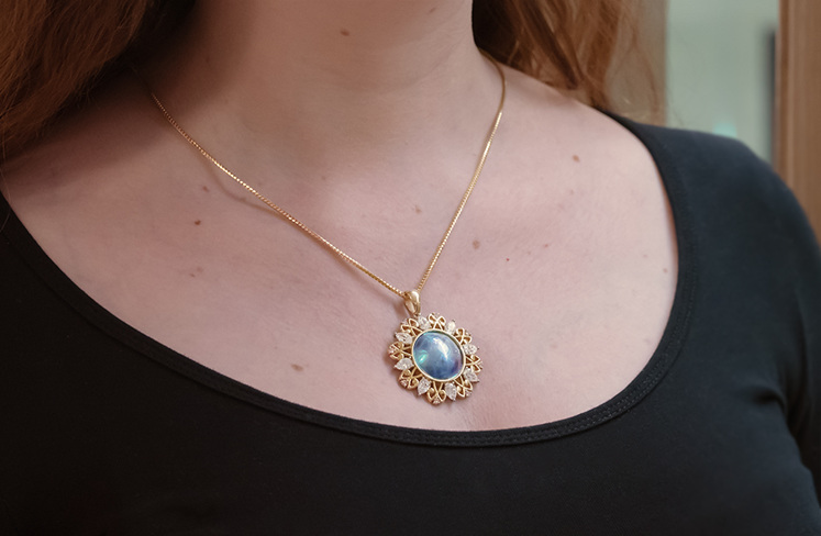Paua pearl, diamond, argyle pink diamond and yellow gold maori design pendant