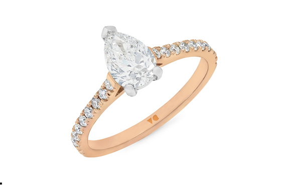 Pear cut diamond solitaire with diamond set band, platinum and 18ct rose gold