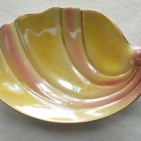 Pink and yellow shell shaped dish