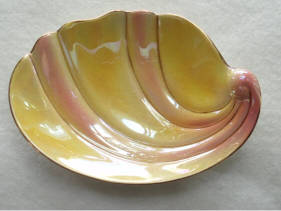 Pink and yellow shell shaped dish