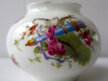 Pretty miniature vase with roses