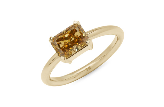 Radiant cut diamond fancy golden orange east-west set solitaire ring