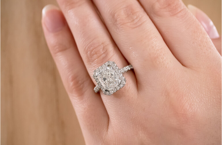 Radiant cut, emerald cut, diamond halo, engagement ring, on hand