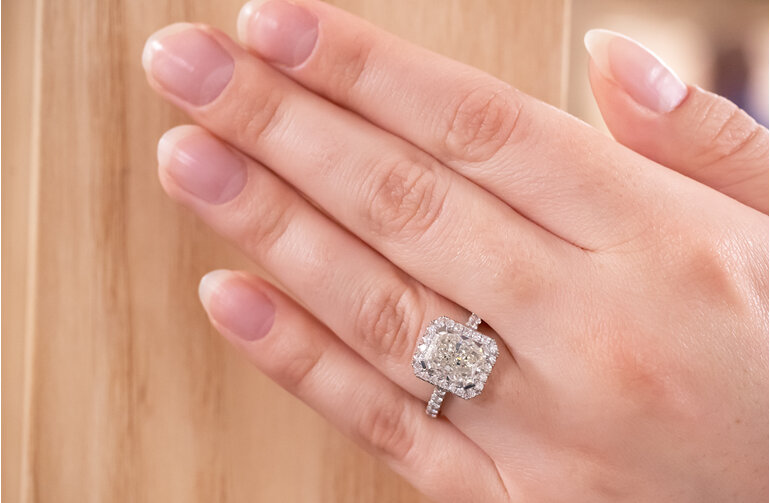 Radiant cut, emerald cut, diamond halo, engagement ring, on hand