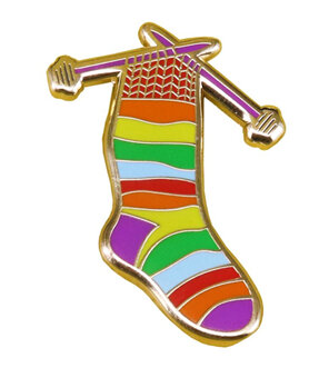 Rainbow coloured striped sock with knitting needles enamel pin