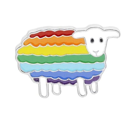 Rainbow striped sheep with white face and legs enamel pin