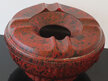 Red bakelite ashtray