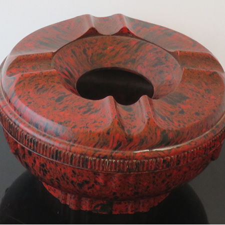 Red mottled bakelite ashtray