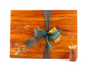 rimu board with paua kiwi