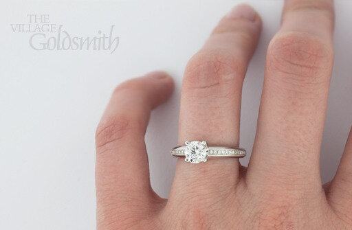 Round Brilliant Cut Diamond Ring with Shoulders on hand