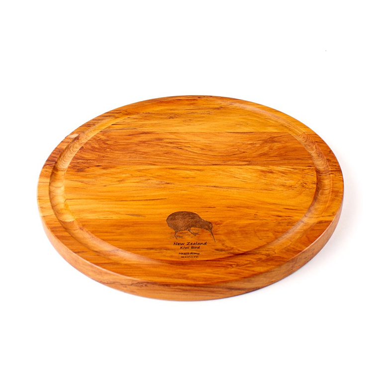 round cheese board with juice groove - kiwi - heart rimu
