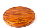 round cheese board with juice groove - silver fern - heart rimu