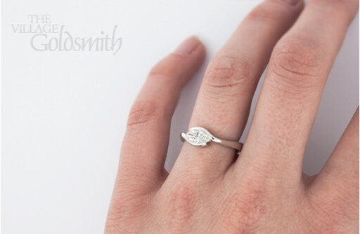 Rub over Marquise Diamond Ring on Hand