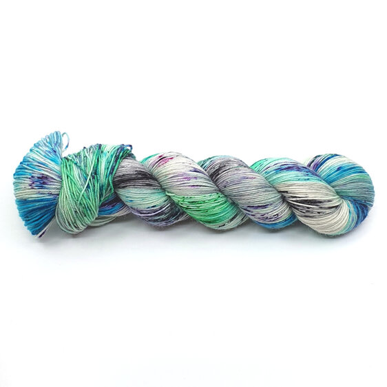 skein 4ply BFL in speckled emerald green, turquoise,  purple, black