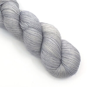 skein of 85/15 merino/nylon in a light grey tonal colour