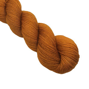 skein of Bluefaced Leicester wool in a golden mustard yellow colour