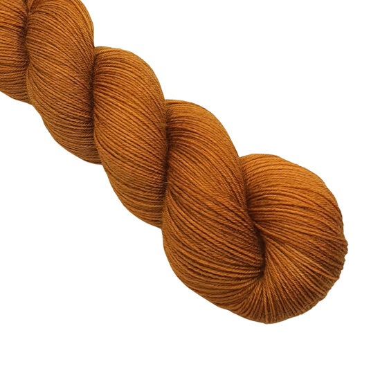 skein of Bluefaced Leicester wool in a golden mustard yellow colour