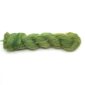 skein of brushed suri alpaca and silk in green hues