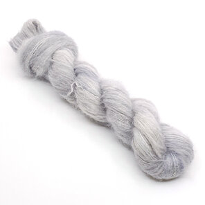 skein of brushed suri alpaca and silk in light platinum grey