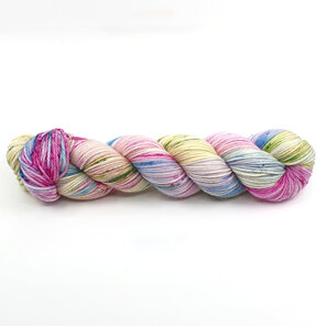 Skein of variegated yarn in pink, blue, lilac, green and yellow hues.