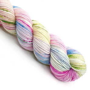 skein of variegated yarn of pink, blue, lilac, green and yellow hues.