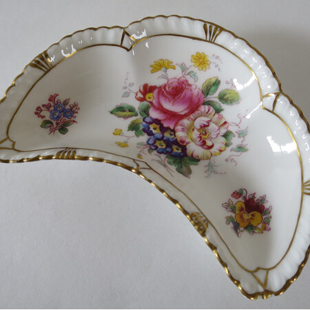 Small crescent shaped dish