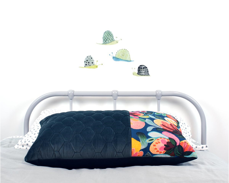 Snail wall decal with floral cushion