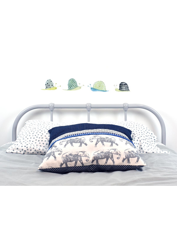 Snail wall decals in line with elephant cushion