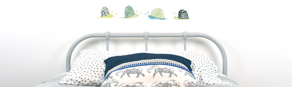 Snails wall decal with bed and elephant cushion