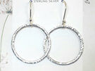 Sparkling sterling silver hoop earrings with hooks. Hammered texture. Handmade