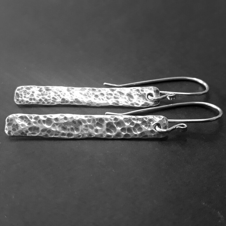 spotted sterling silver earrings with hammered texture