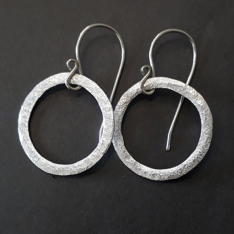 sterling silver circle earrings with rock texture