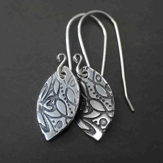 Sterling silver earrings with textured and oxidised surface
