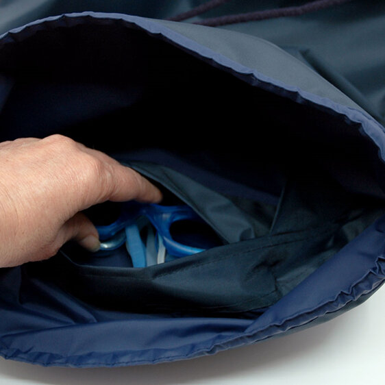 swim pouch navy showing pocket inside bag in use