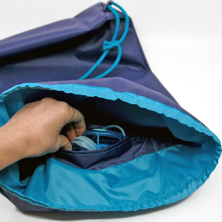 swim pouch purple with turquoise contrast showing pocket inside bag